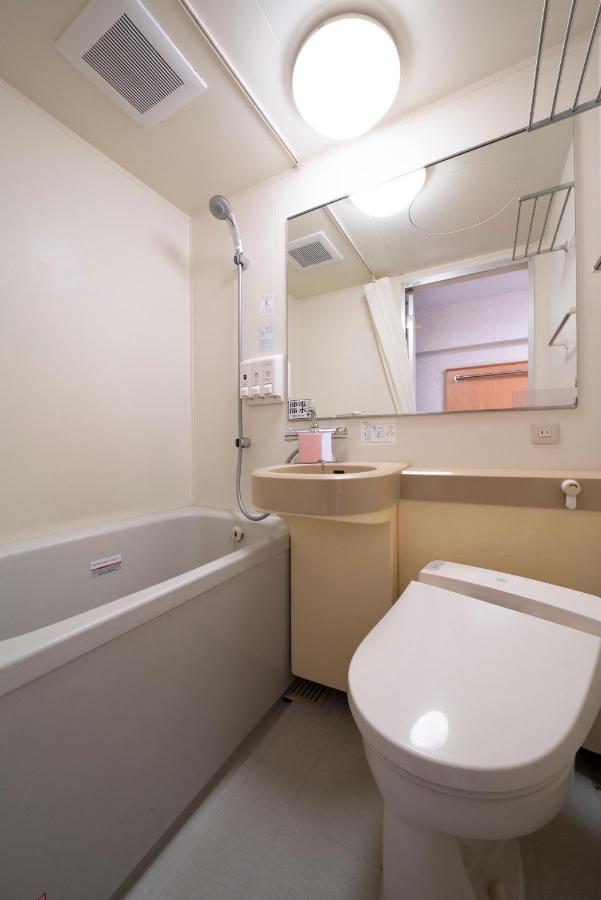 Hotel Econo Yokkaichi Bagian luar foto